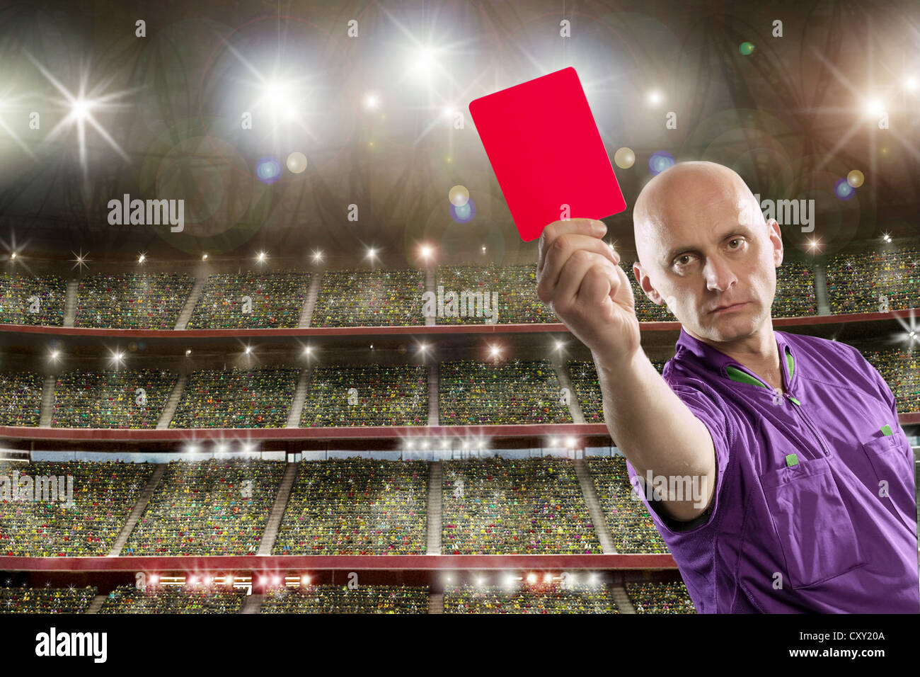 Referee holding a red card Stock Photo
