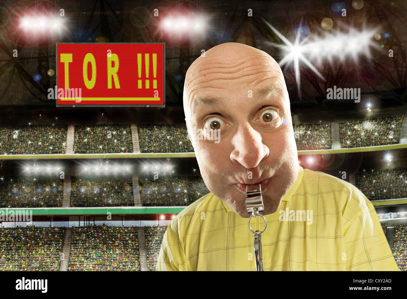 Referee with a whistle, score board, lettering 'Tor', German for 'goal', soccer stadium Stock Photo