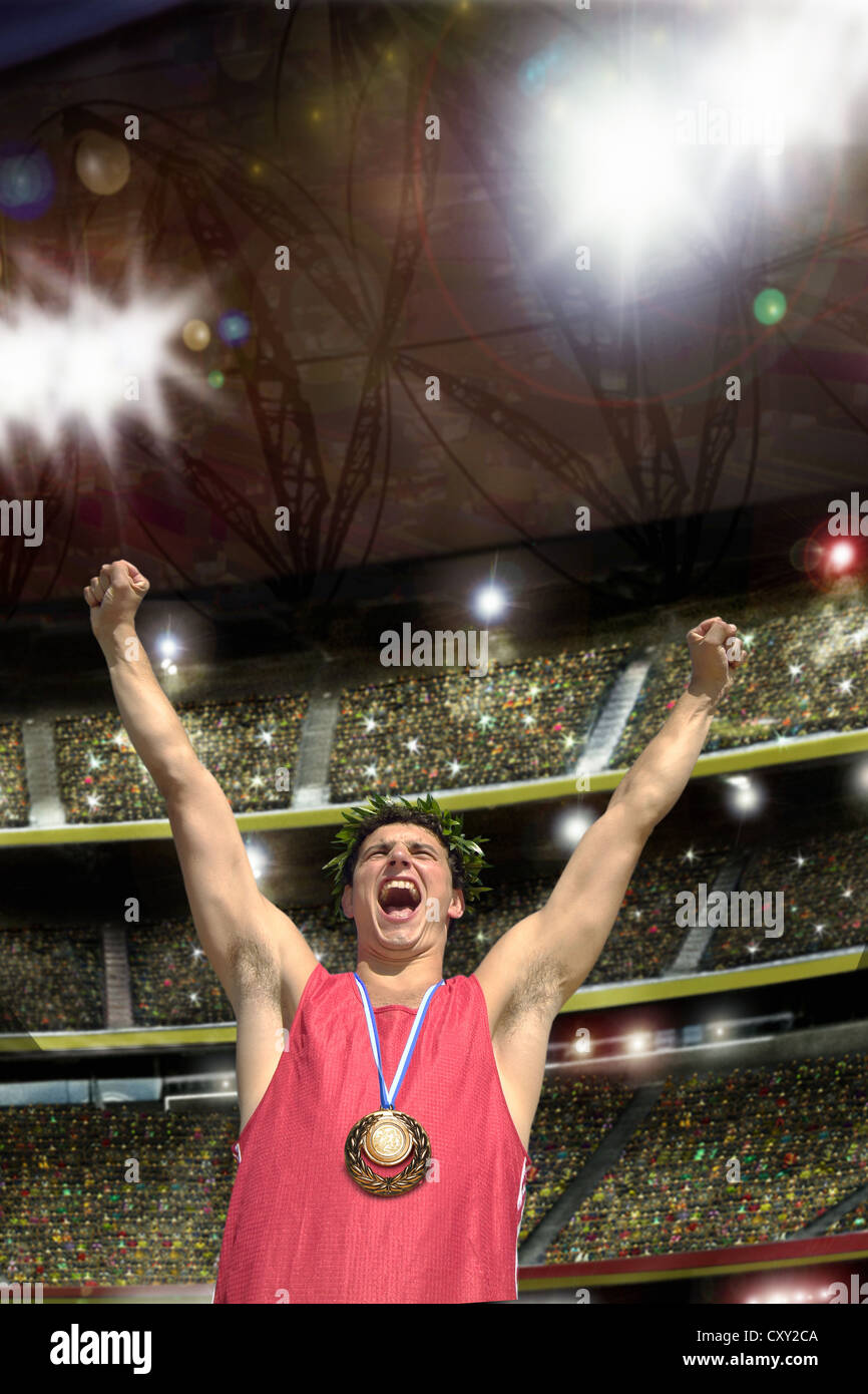 Winner, gold medal, cheering, stadium, fireworks Stock Photo