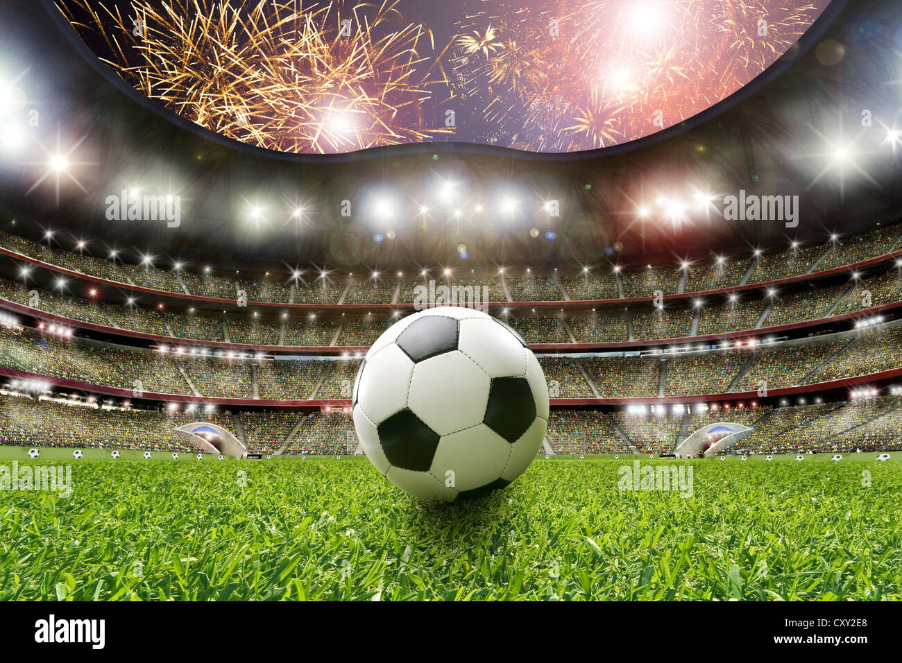 Soccer ball, soccer stadium, lawn, grand stand, fireworks Stock Photo