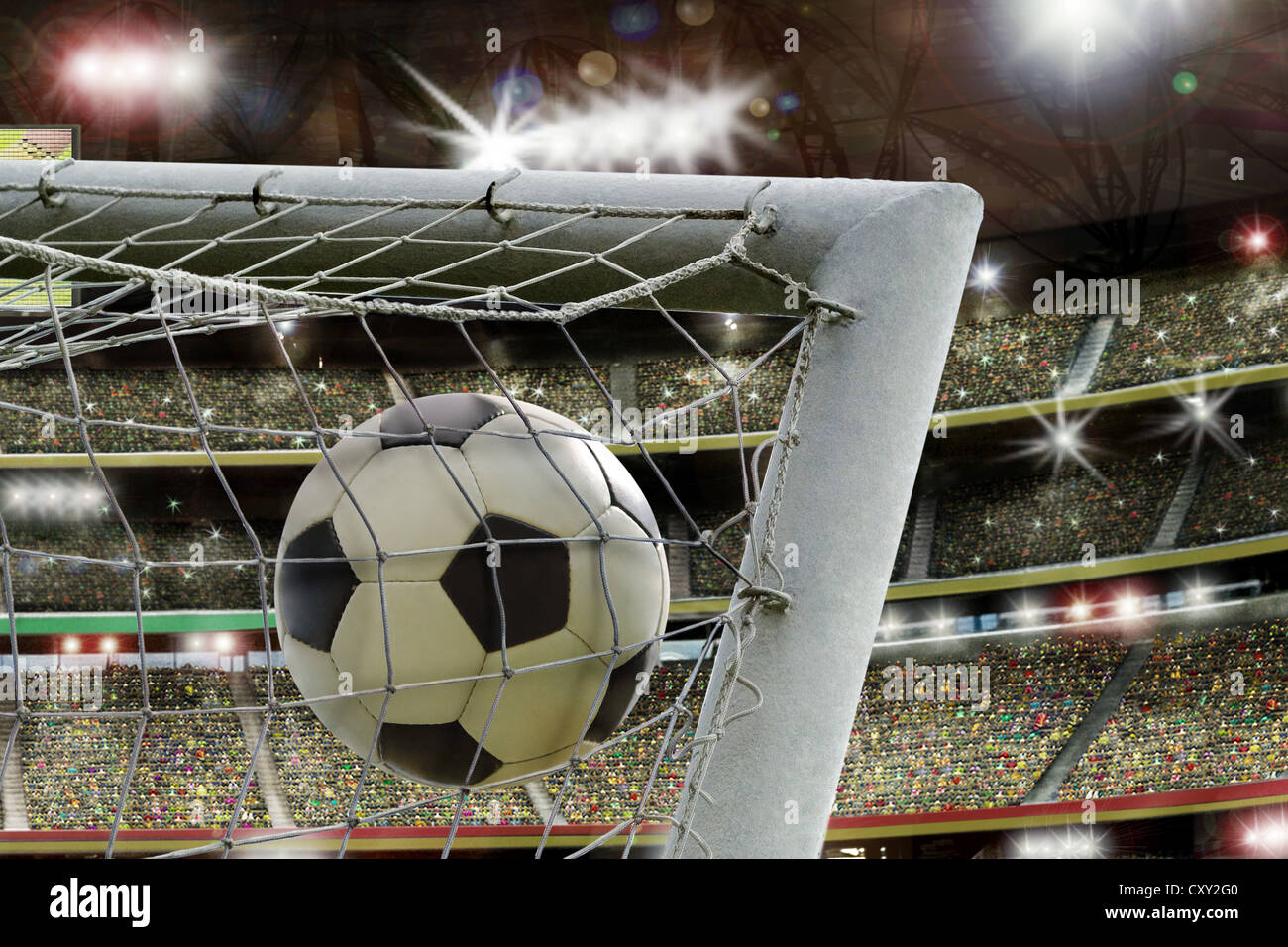 Soccer stadium, net, soccer ball, goal, grand stand Stock Photo