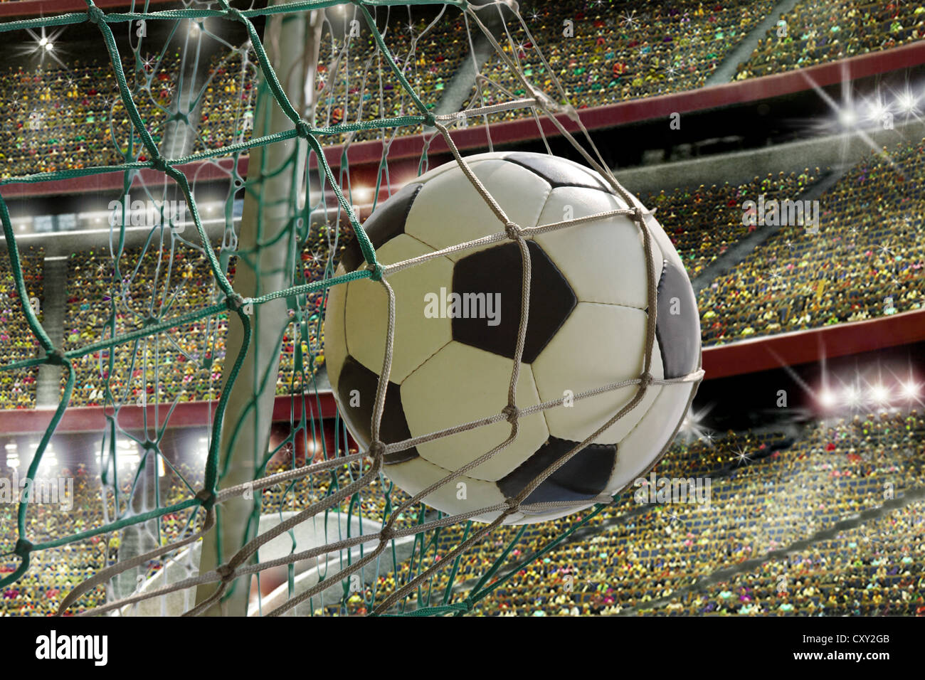 Soccer stadium, net, soccer ball, goal, grand stand Stock Photo