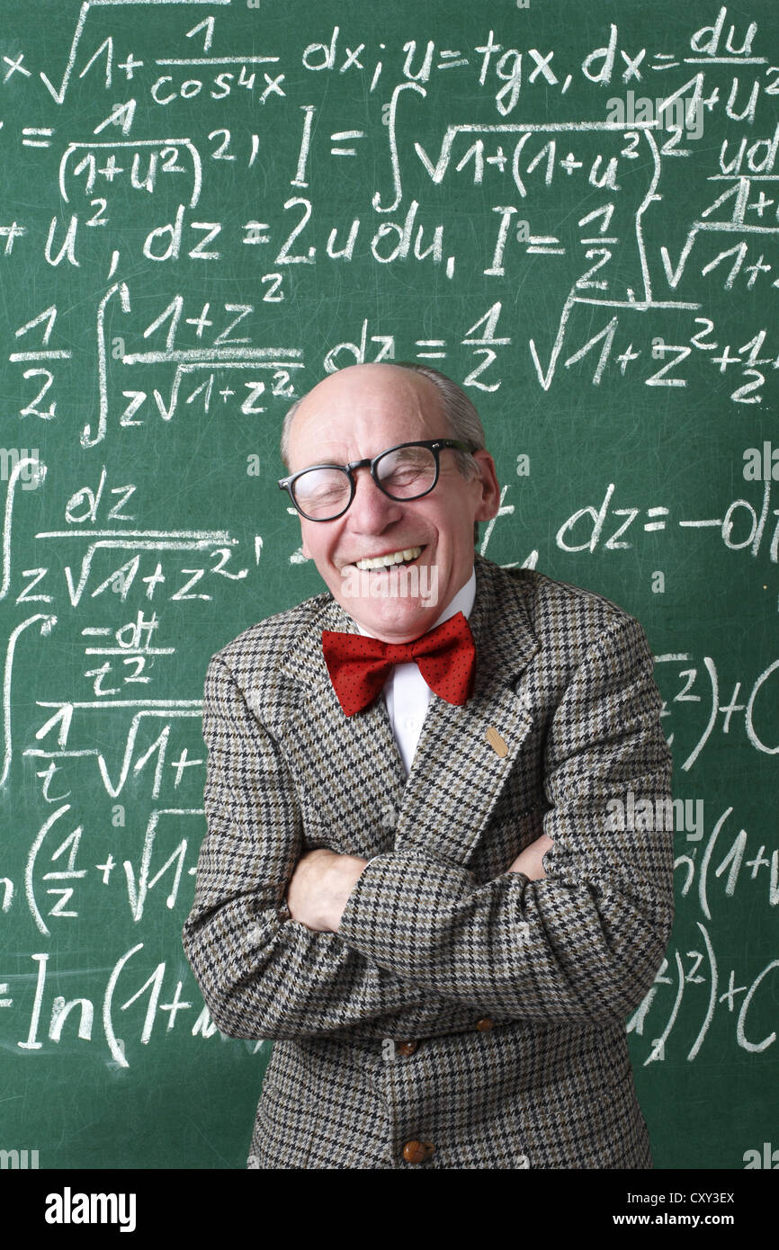 Professor, teacher, blackboard, mathematic formulas, equations, mathematic lessons, maths Stock Photo