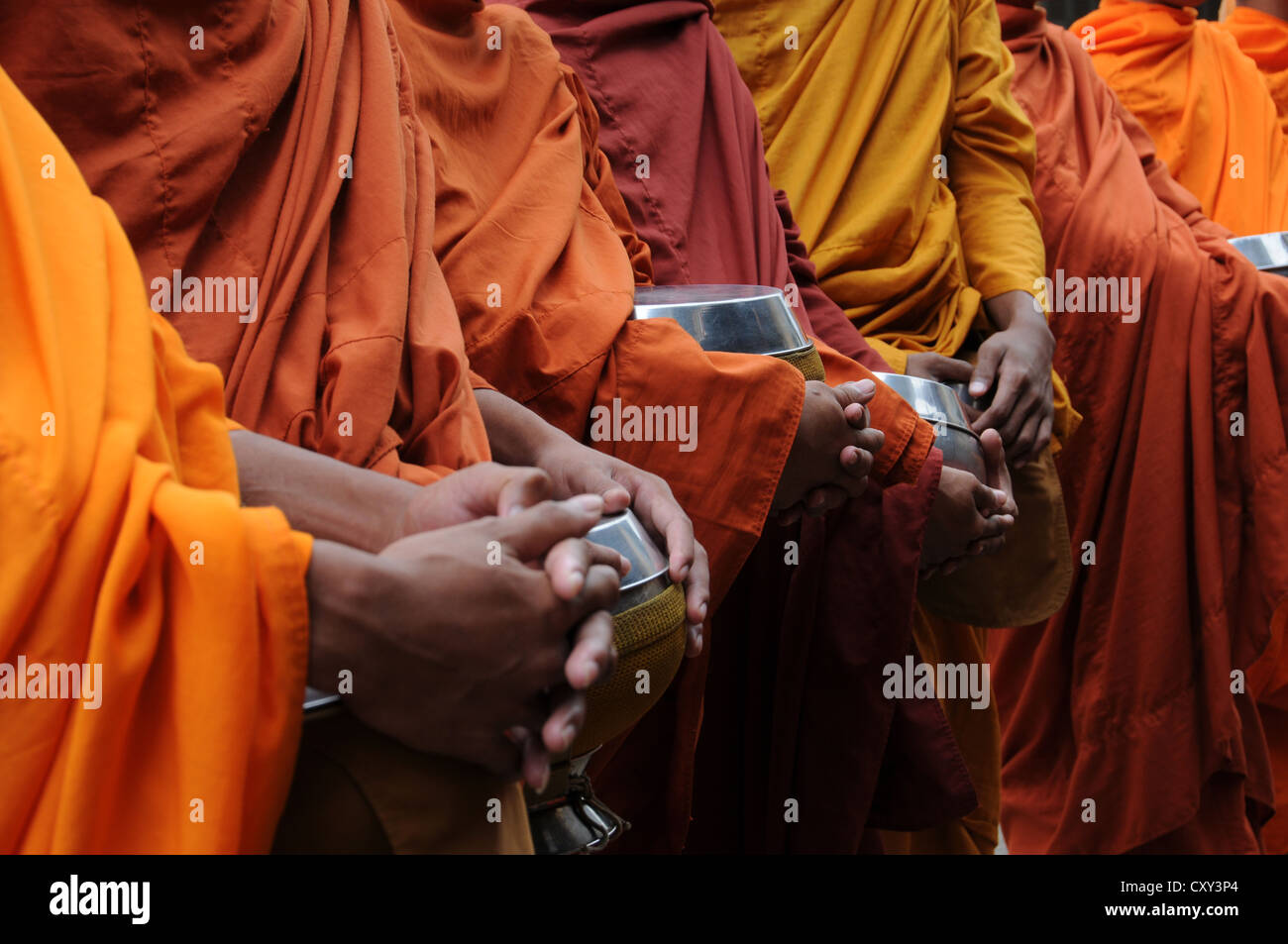 Cambodian monks begging in the morning, Battambang, Cambodia, Asia Stock Photo