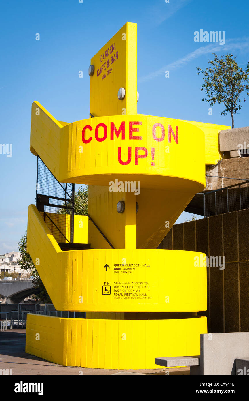 London Southbank bright yellow painted stairs to Royal Festival Queen Elizabeth Hall Roof Garden come on up Stock Photo