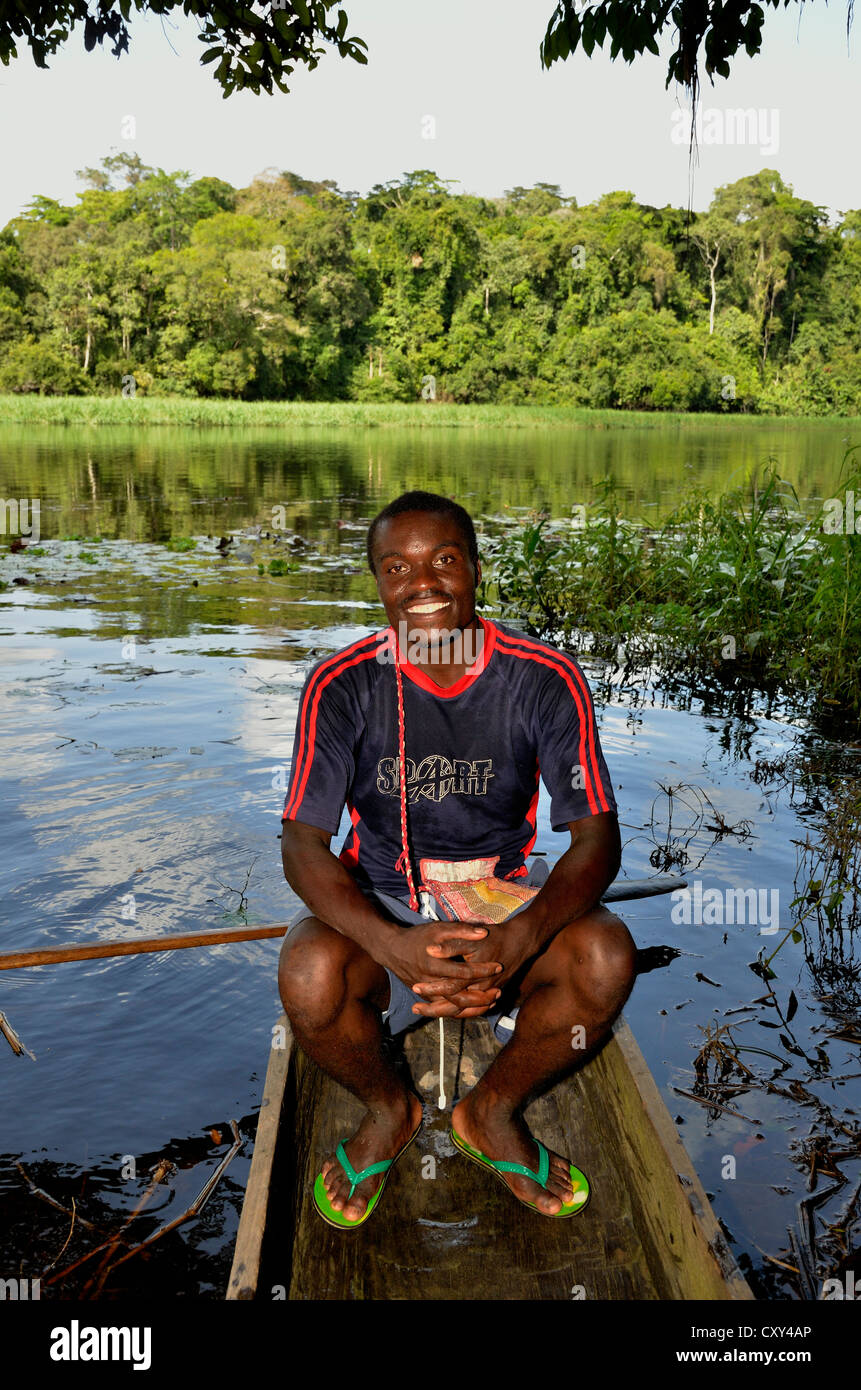 Tourist guide in a canoe on the Nyong river, near Yaoundé, Cameroon, Central Africa, Africa Stock Photo