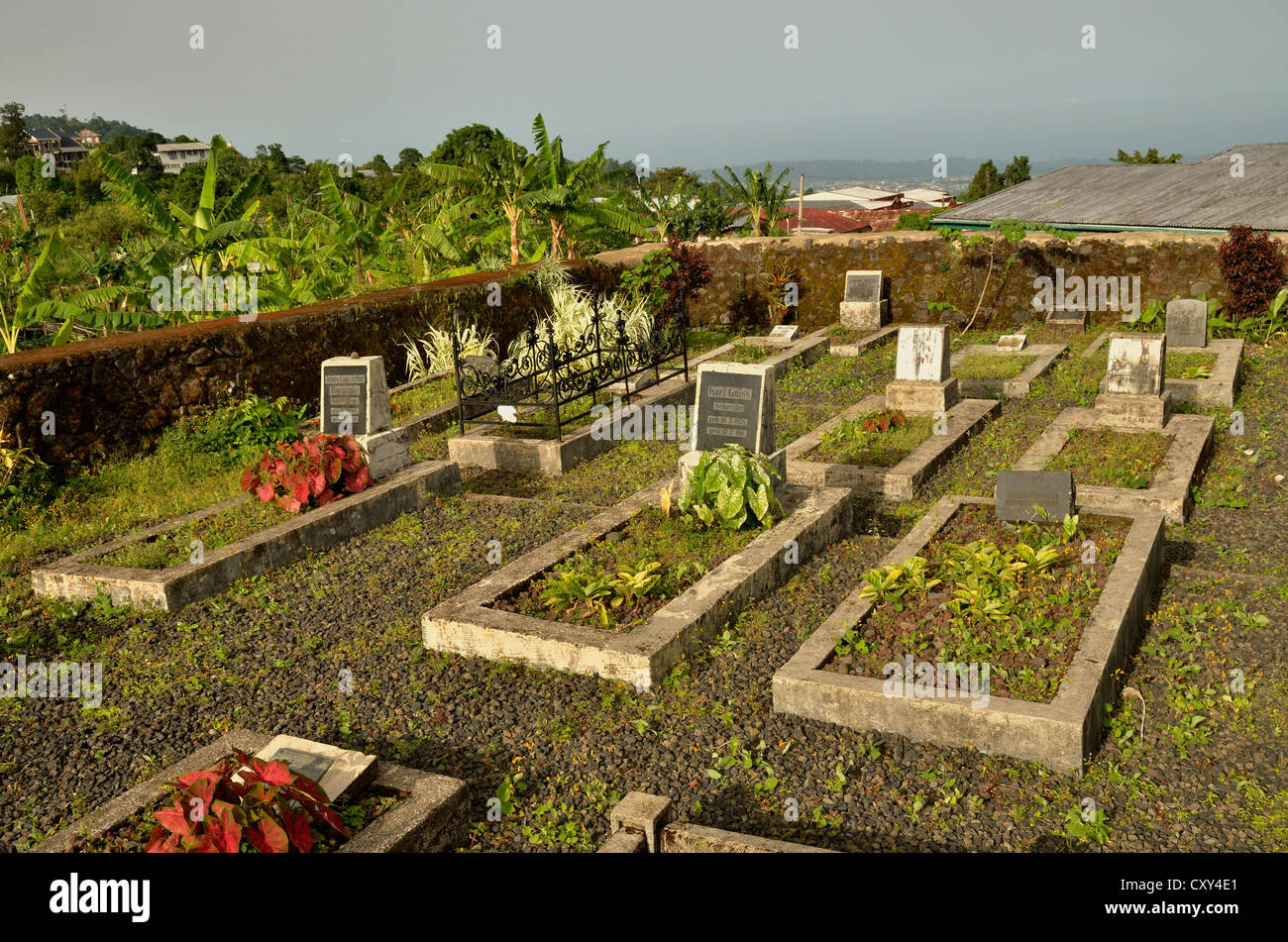 Graves on the German Cemetery in the town of Buéa at the foot of Mount Cameroon, 4095 metres, Cameroon, Central Africa, Africa Stock Photo