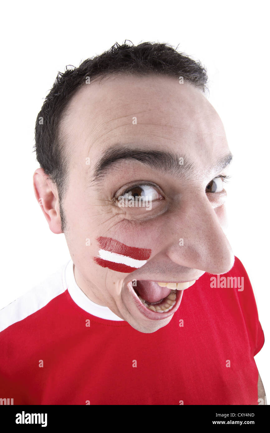 Young man, football fan with a painted face, Austrian national flag Stock Photo