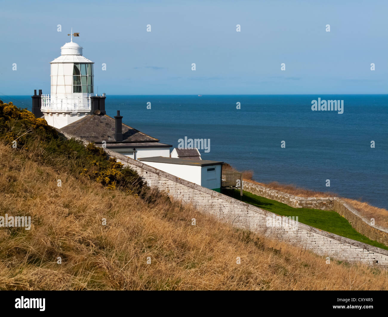 Whitby lighthouse or High Light on the coast south of Whitby in North Yorkshire England UK designed by James Walker built 1958 Stock Photo