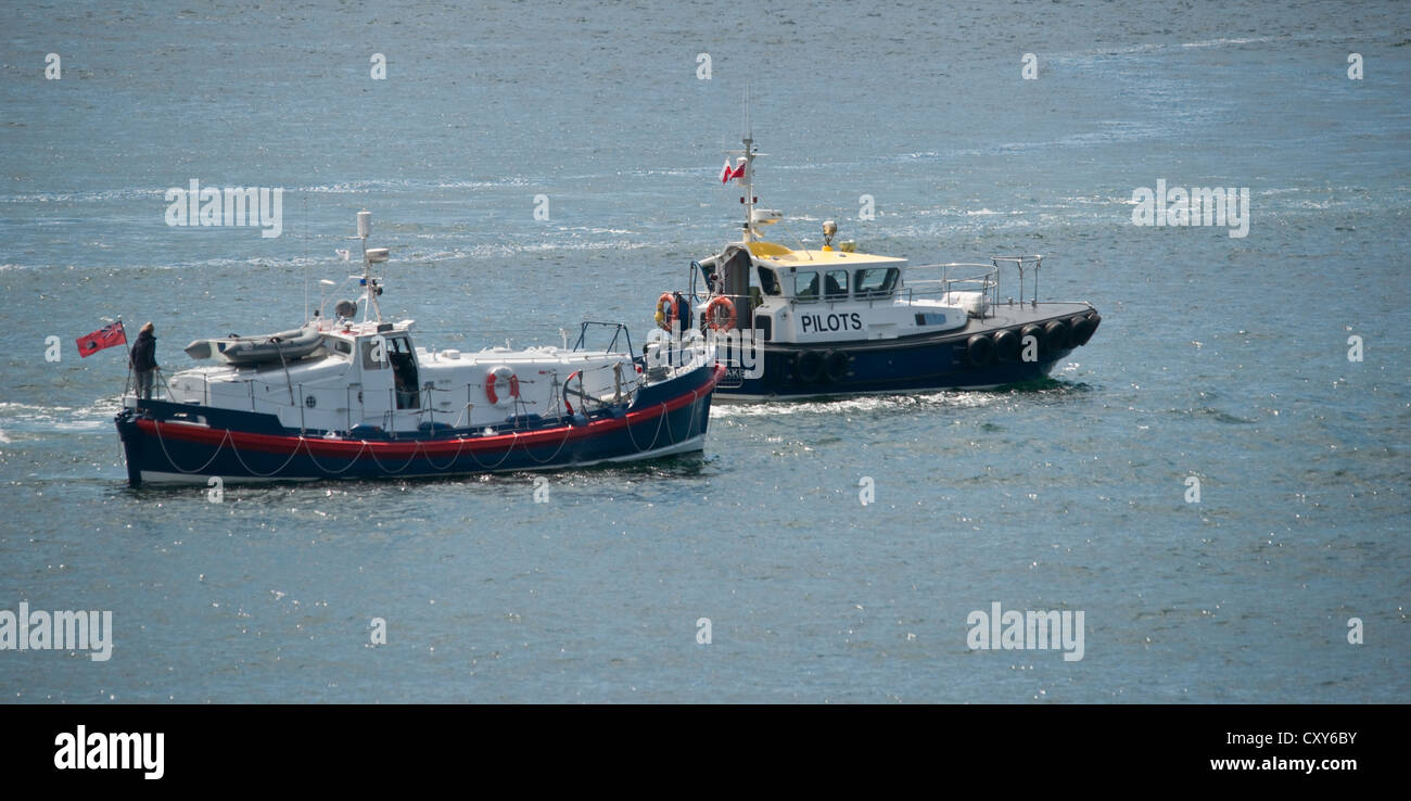 Pilot boat and harbour boat on the water Stock Photo - Alamy