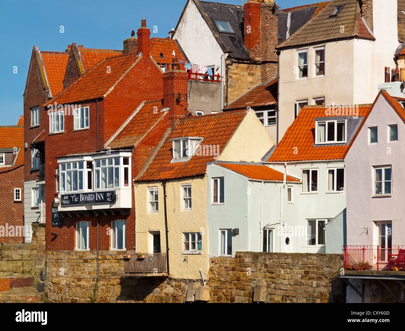 Typical houses with red tiled roofs in Whitby North Yorkshire UK a
