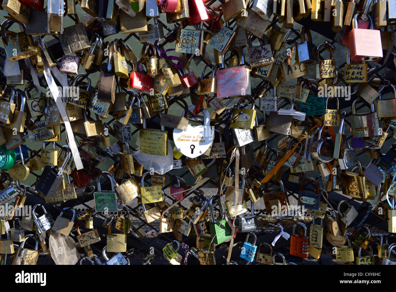 Lover's padlocks or love locks which adorn many bridges in Paris, France Stock Photo