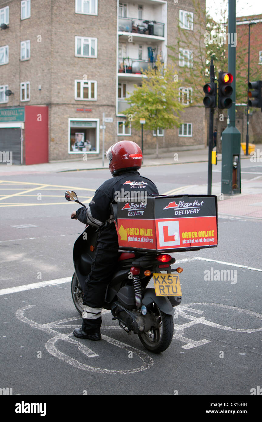 Pizza Hut delivery motorcycle Stock Photo - Alamy