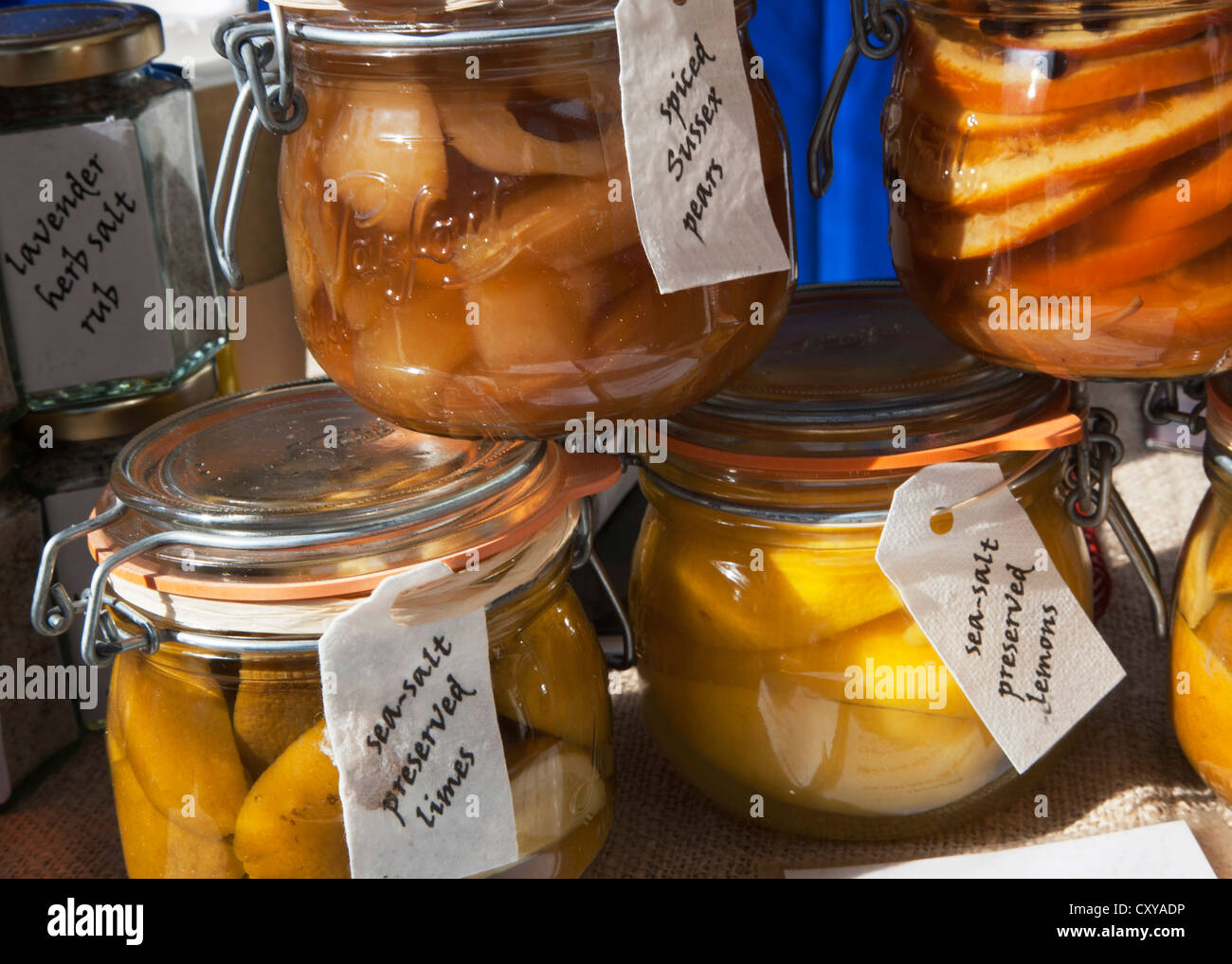 Preserved fruit in jars at a Farmers Market Stock Photo Alamy