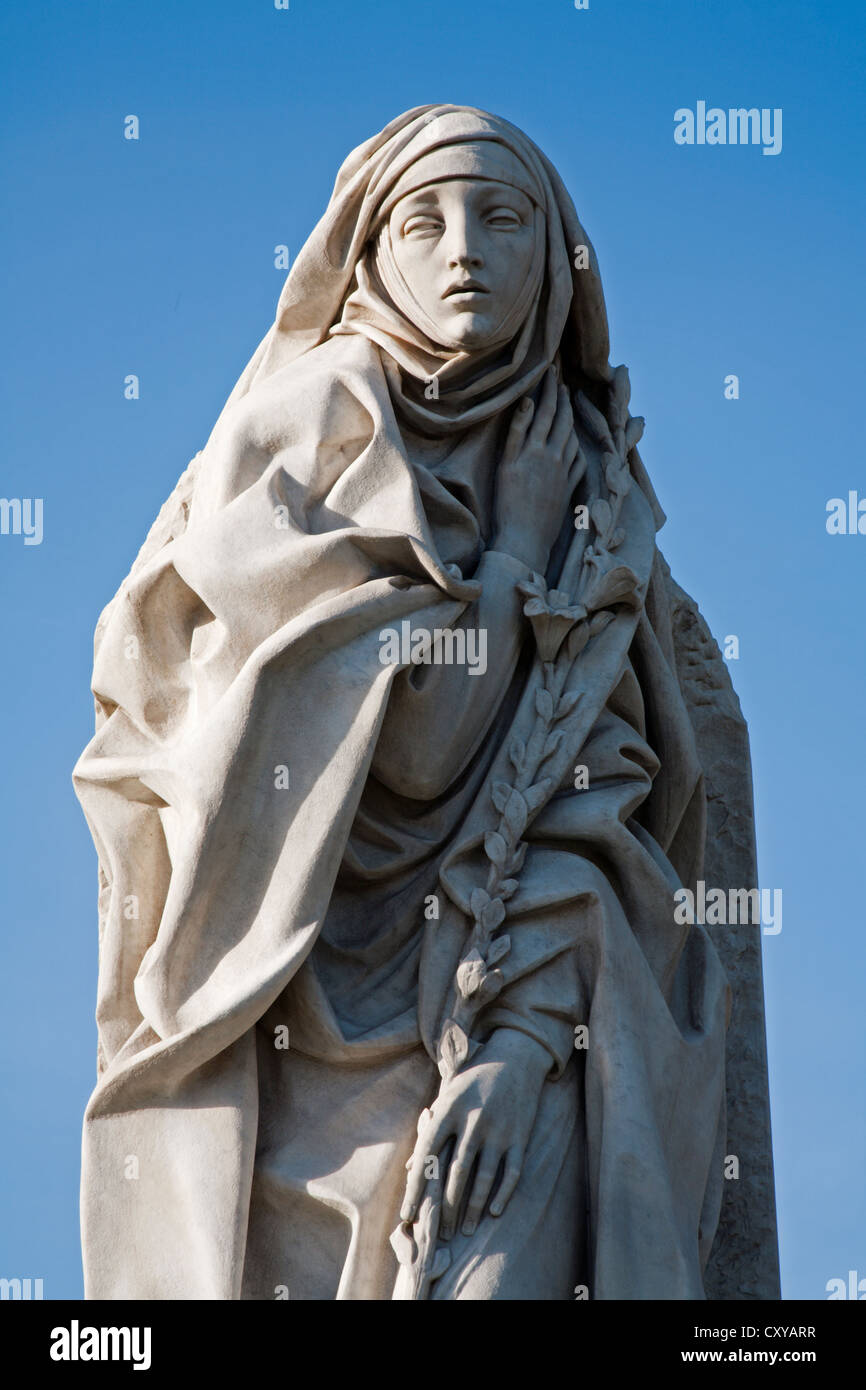 Rome - st. Katharine from Siena statue by Angels bridge Stock Photo