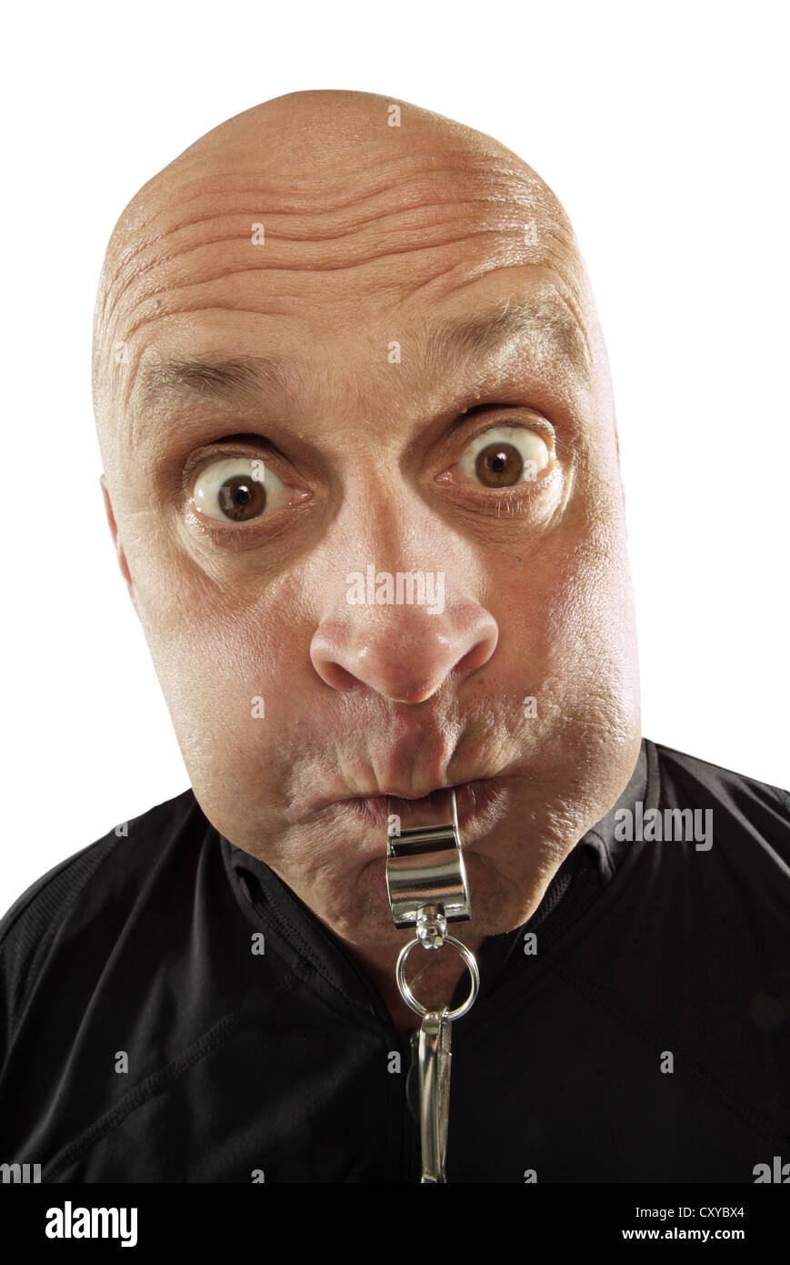 Referee blowing a whistle, energetic, portrait Stock Photo