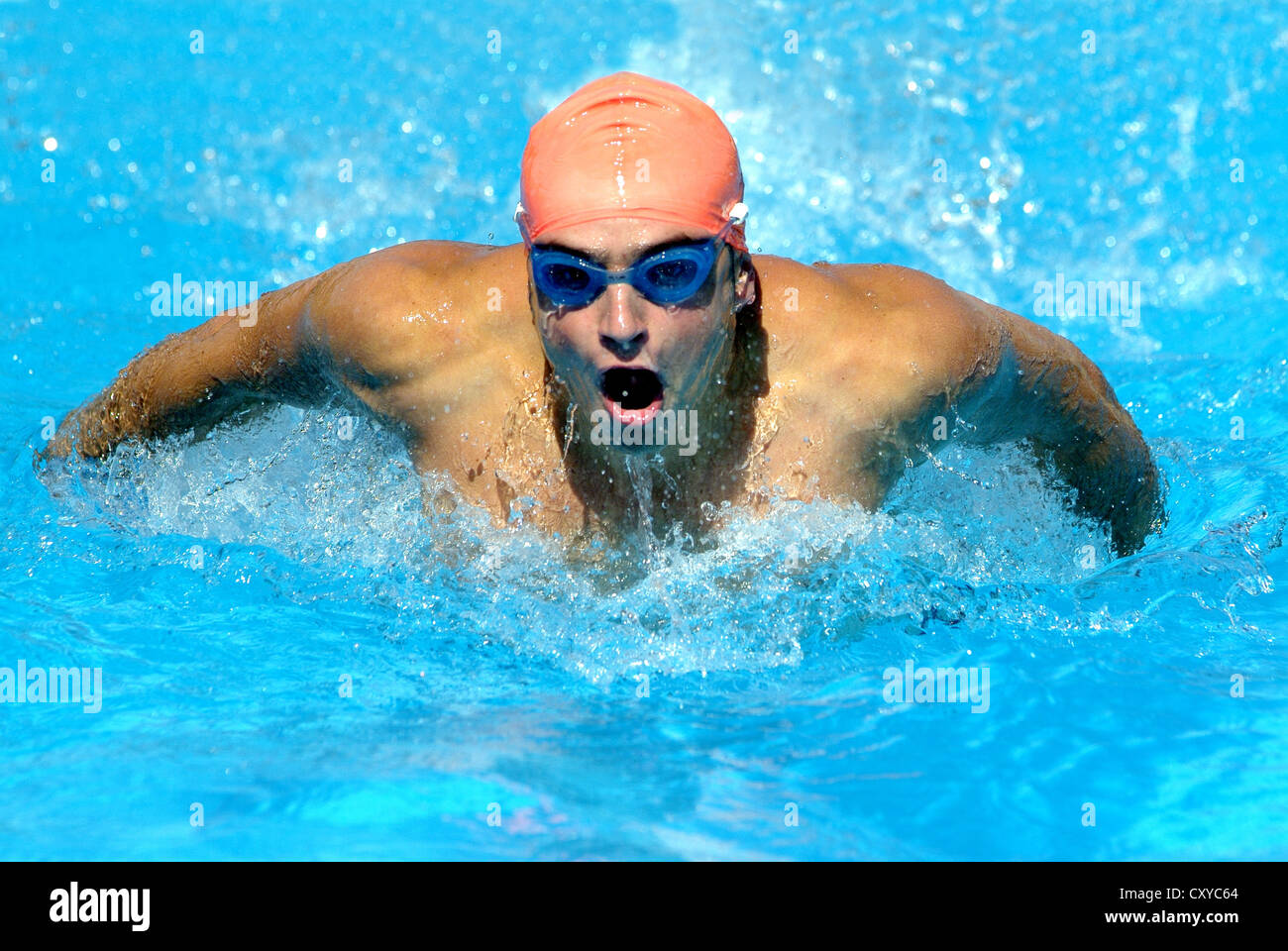 Swimmer swimming butterfly style Stock Photo Alamy
