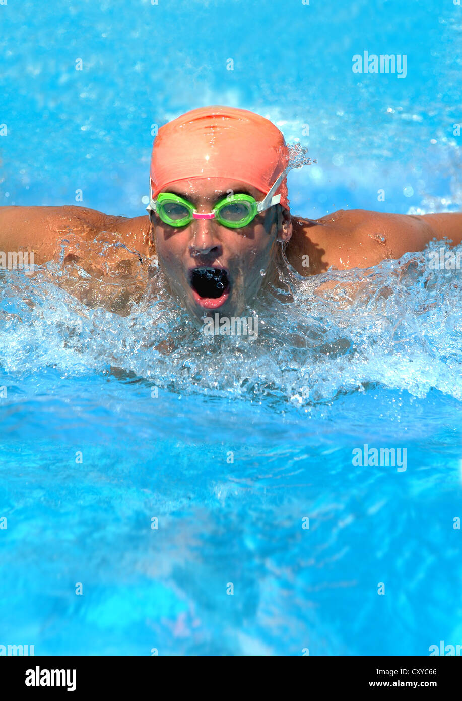 Swimmer swimming butterfly style Stock Photo Alamy