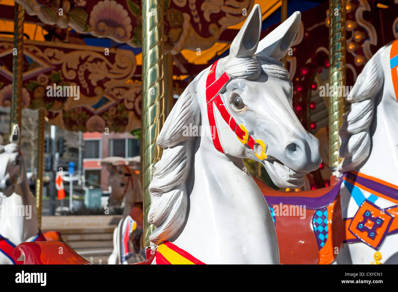 Old carousel with horses, detail view Stock Photo