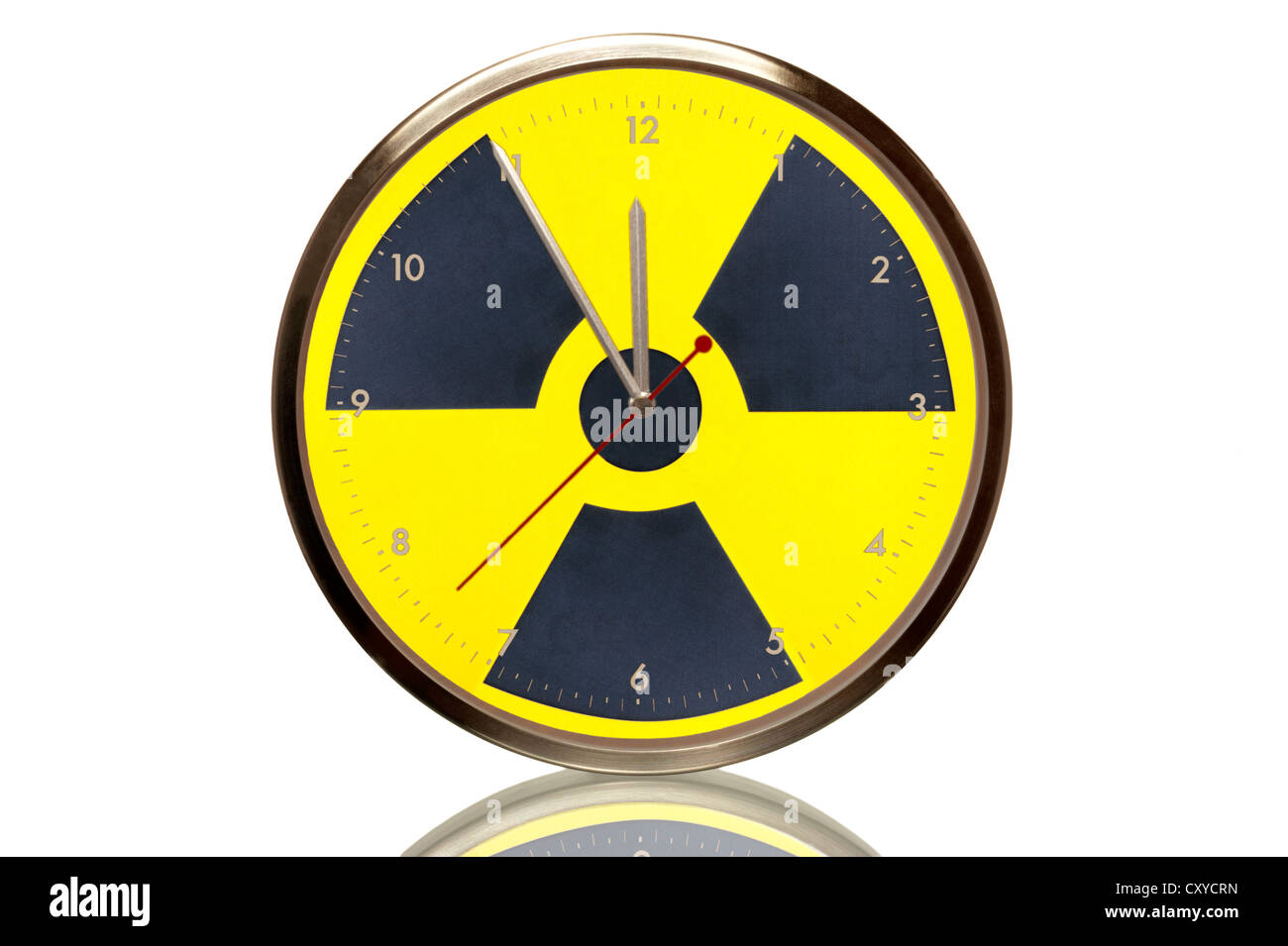 Clock with the nuclear symbol, 5 minutes to twelve, eleventh hour, symbolic image for nuclear