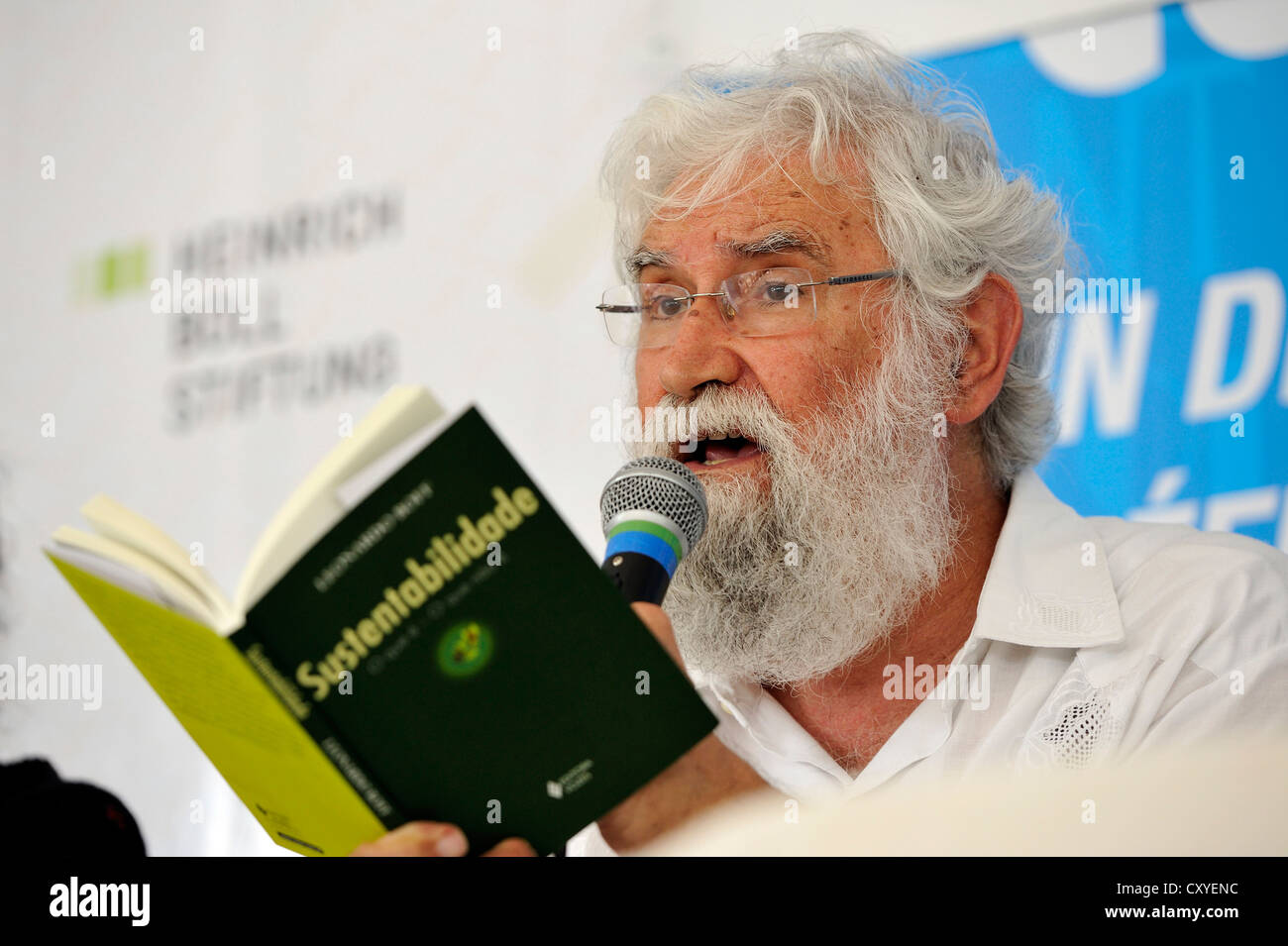 Leonardo Boff, a prominent liberation theologian, reads from his book 'Sustentabilidade', 'sustainability' at a panel Stock Photo