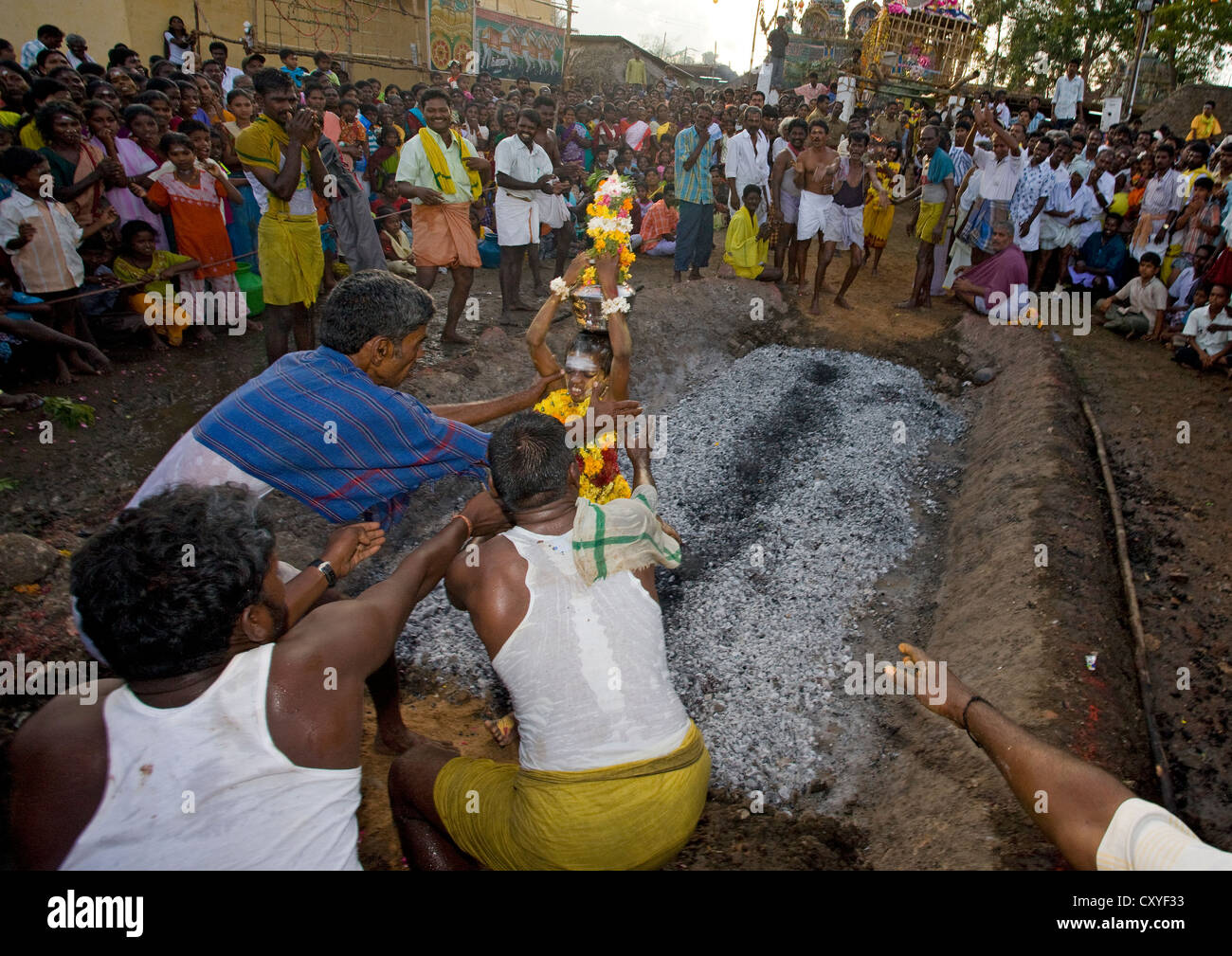 Young Suffering Child Succeeding Fire Walking Ritual In Front Of A ...