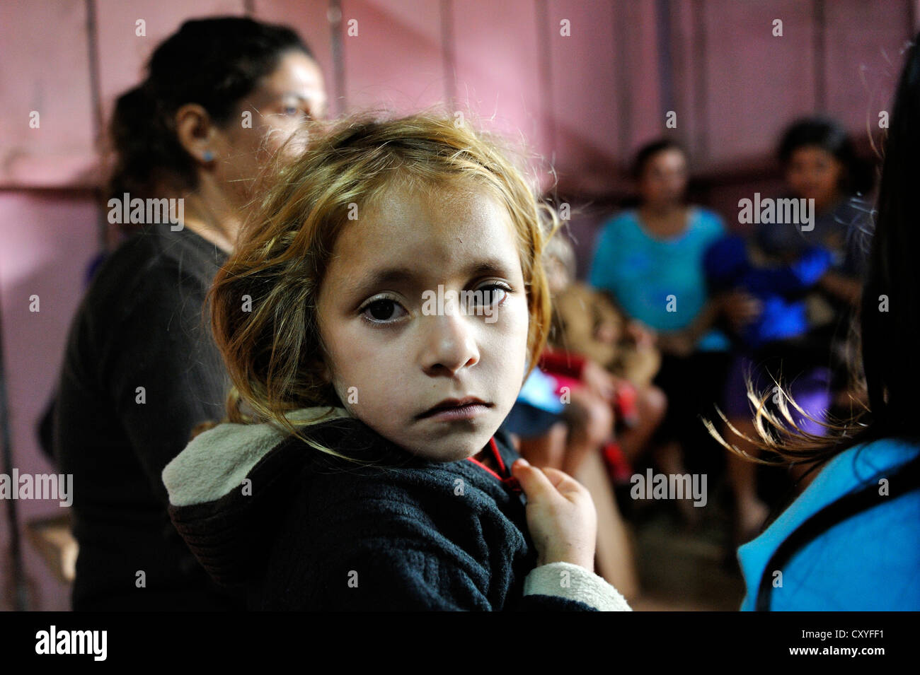 Girl during a meeting of an aid organisation that provides health services and information for mothers and children, portrait Stock Photo