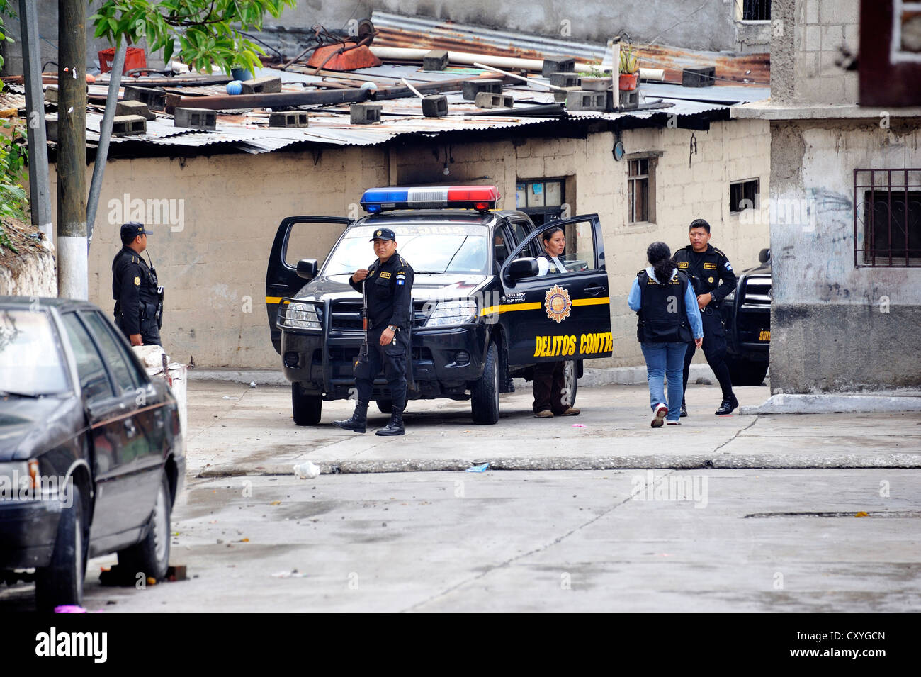 Heavily armed police units patrolling in the poor neighborhood of El Esfuerzo, the district is controlled by rivalling gangs of Stock Photo