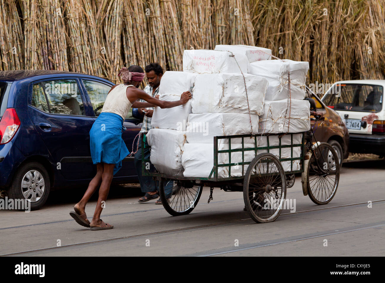 Transportation of Goods on a Bicycle in Kolkata, India Stock Photo