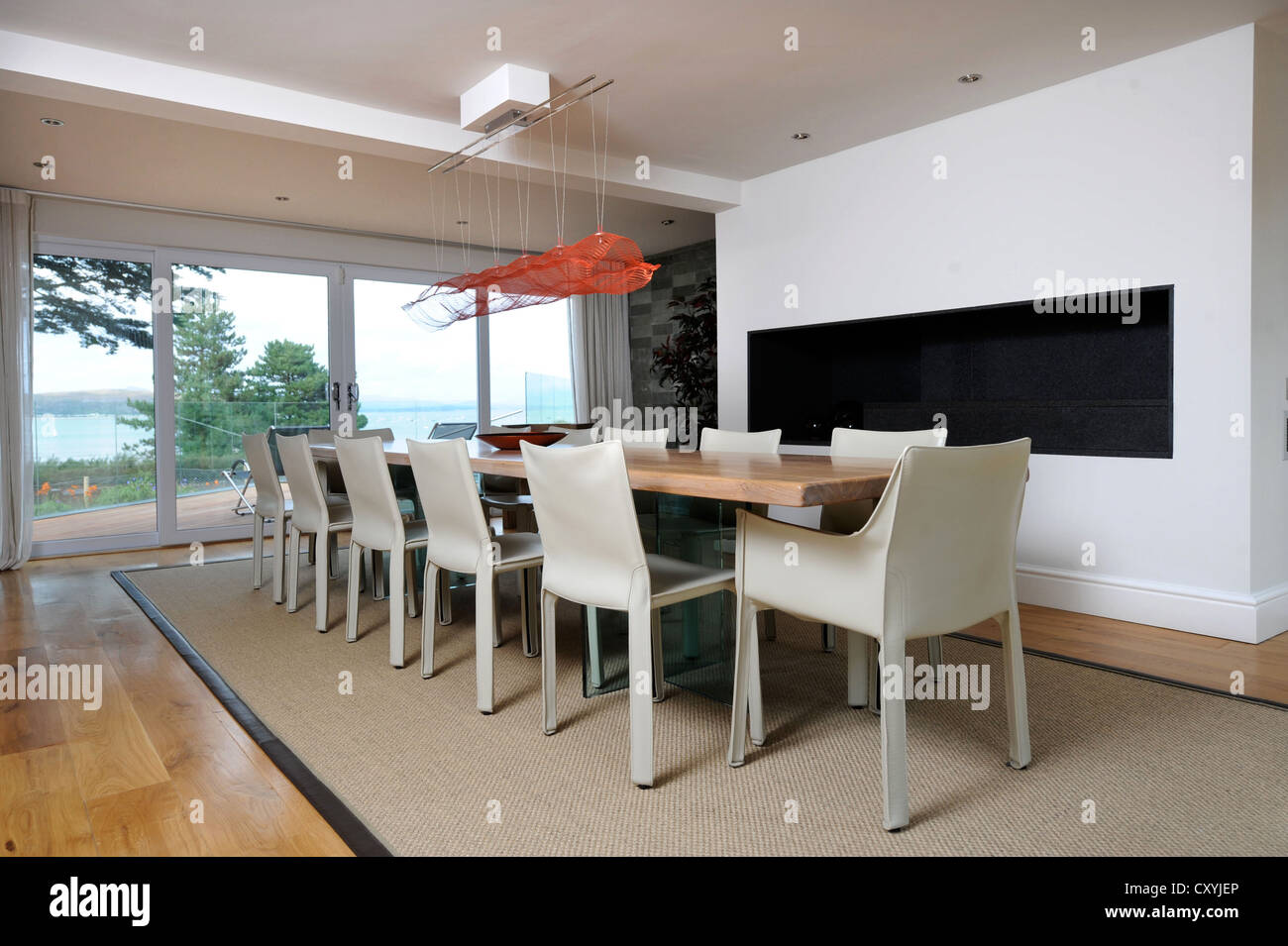 The dining room of a luxury holiday home near Abersoch on the Lleyn Peninsula in North Wales UK Stock Photo