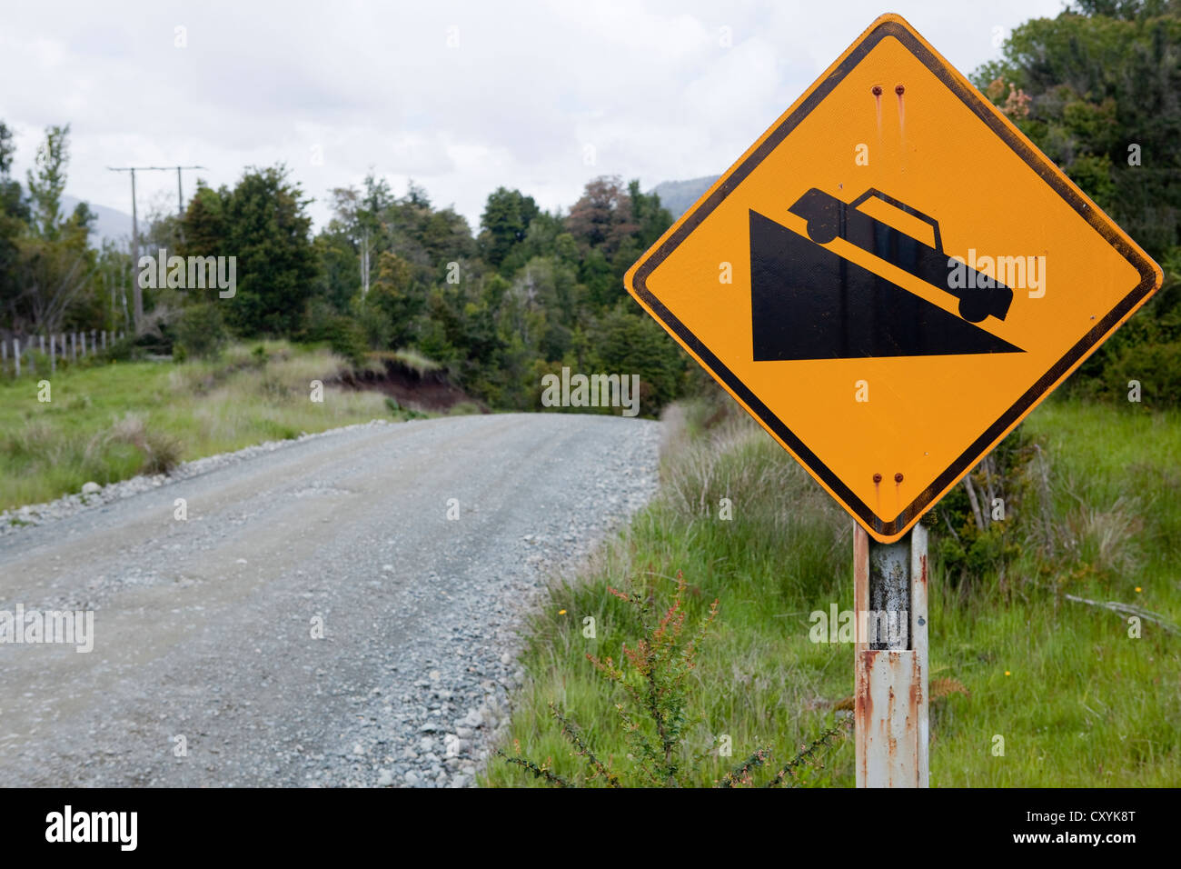 Chilean street sign, caution slope, Carretera Austral, Ruta CH7 road, Panamerican Highway, Region de Aysen, Patagonia, Chile Stock Photo