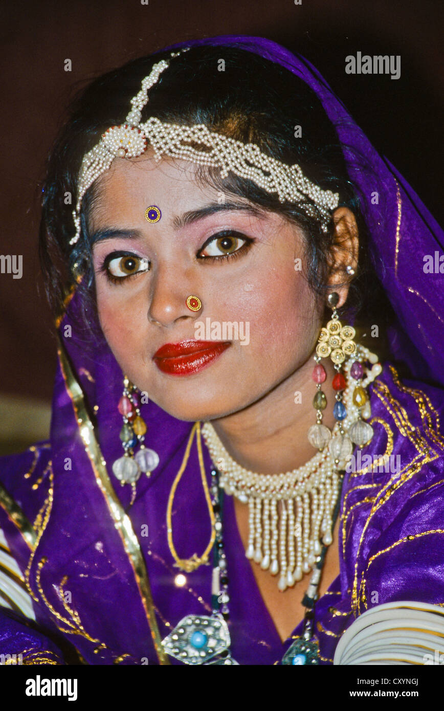 Young female dancer, beautifully dressed, waiting for her performance, portrait, Udaipur, India, Asia Stock Photo