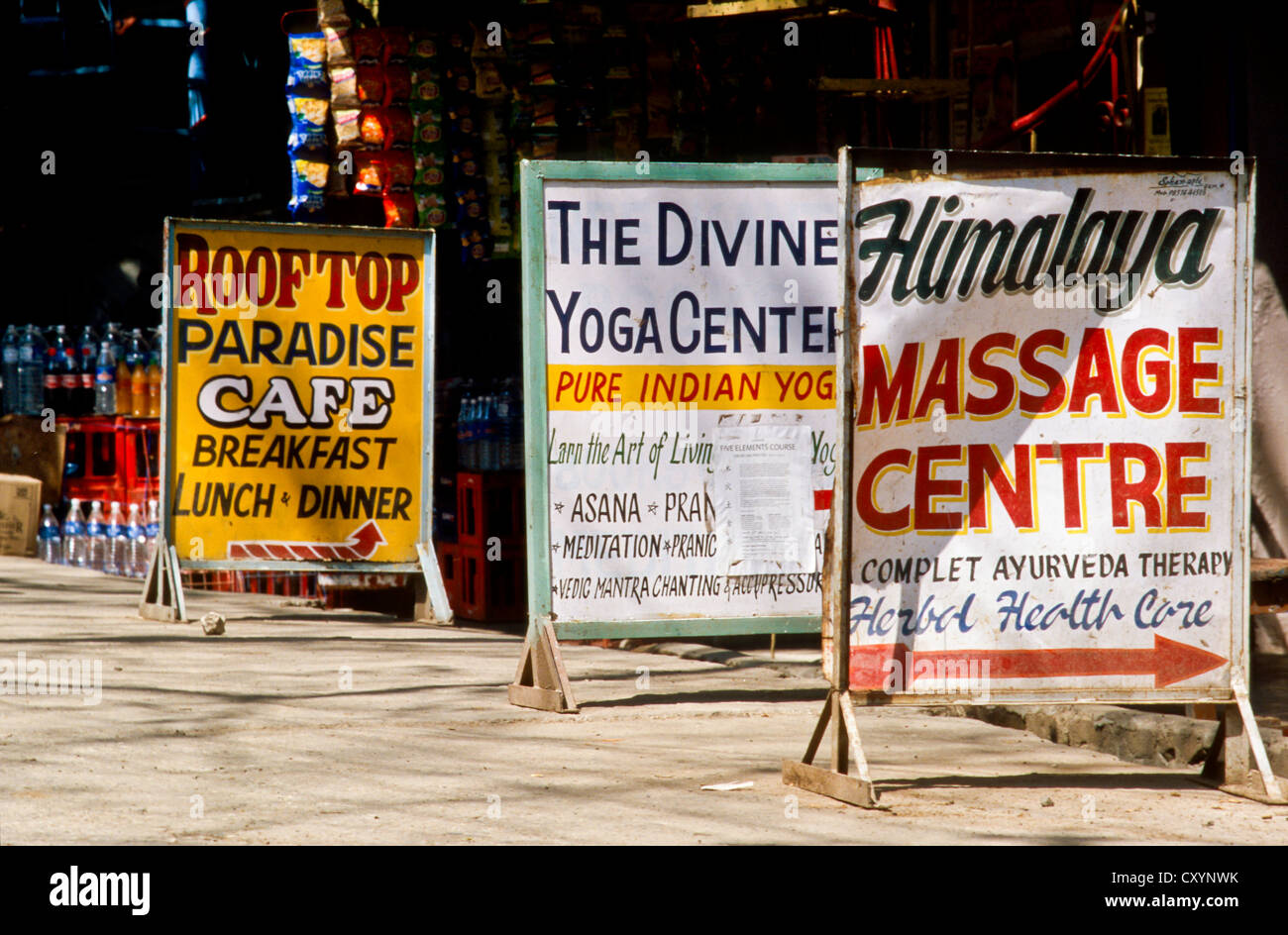 Advertising boards offering services to tourists, in Rishikesh, Uttaranchal, India, Asia Stock Photo