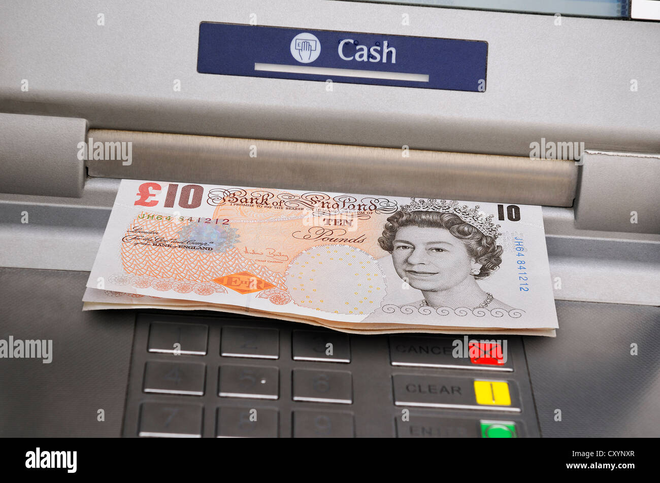Cashpoint Dispensing Cash, UK. Stock Photo