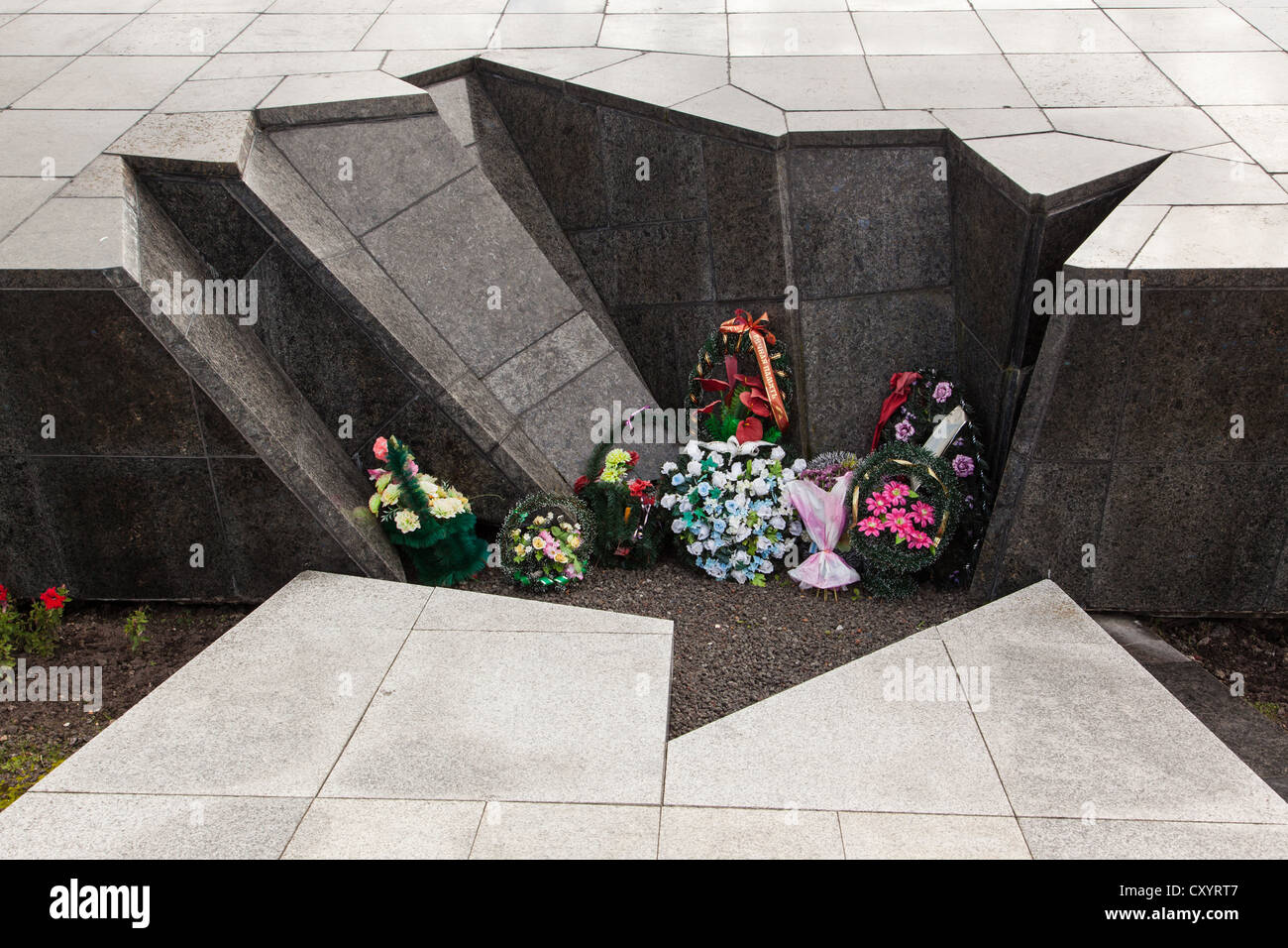 Flowers at the Khatyn Memorial, built to remember the Belarussian fallen of the Great Patriotic War. Stock Photo