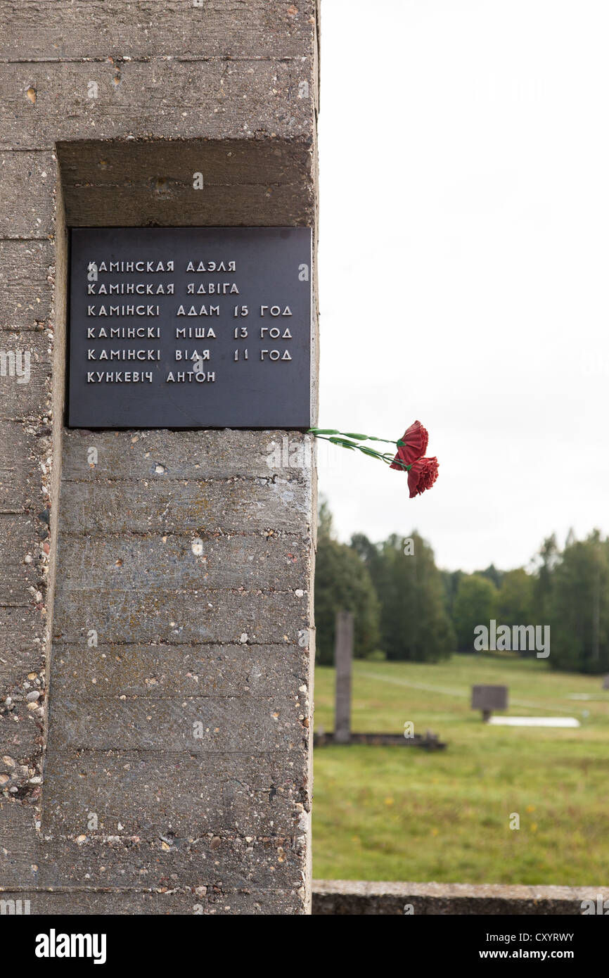 Red carnation on a  bell tower at the Khatyn Memorial, built to remember the Belarussian fallen of the Great Patriotic War. Stock Photo