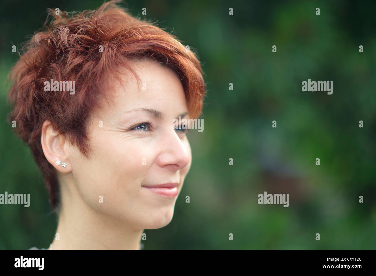 Smiling Young Woman With Short Red Hair Portrait Stock Photo Alamy