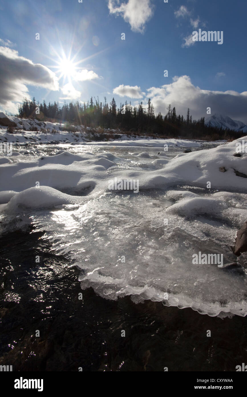 Ice, snow and water at freezing Quill Creek, St. Elias Mountains, Kluane Range behind, Kluane National Park and Reserve Stock Photo