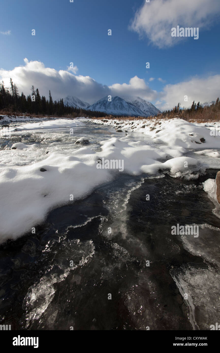 Ice, snow and water at freezing Quill Creek, St. Elias Mountains, Kluane Range behind, Kluane National Park and Reserve Stock Photo