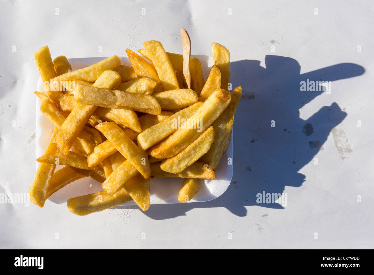 Chips portion on paper outdoors Stock Photo