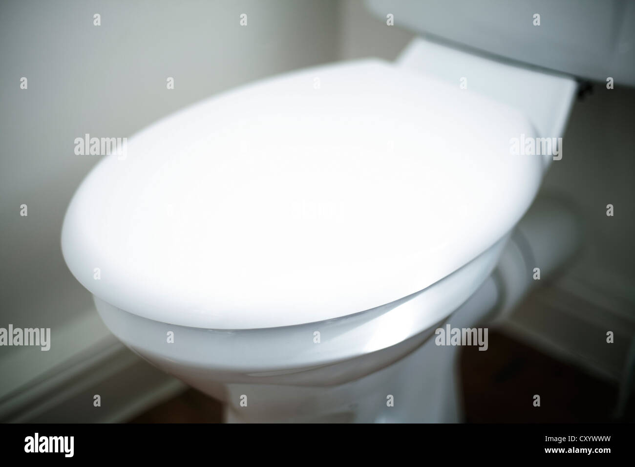 Toilet and seat in shallow focus Stock Photo