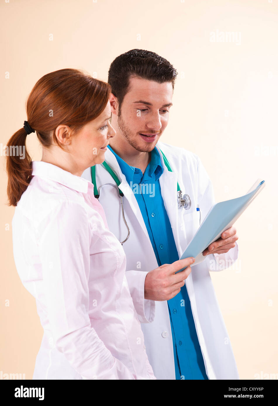 Young doctor in consultation with a patient Stock Photo