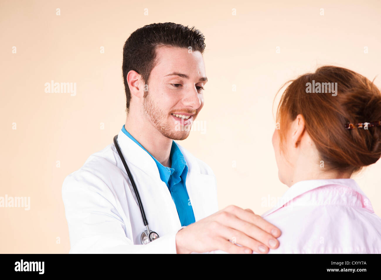 Doctor and young patient hi-res stock photography and images - Alamy