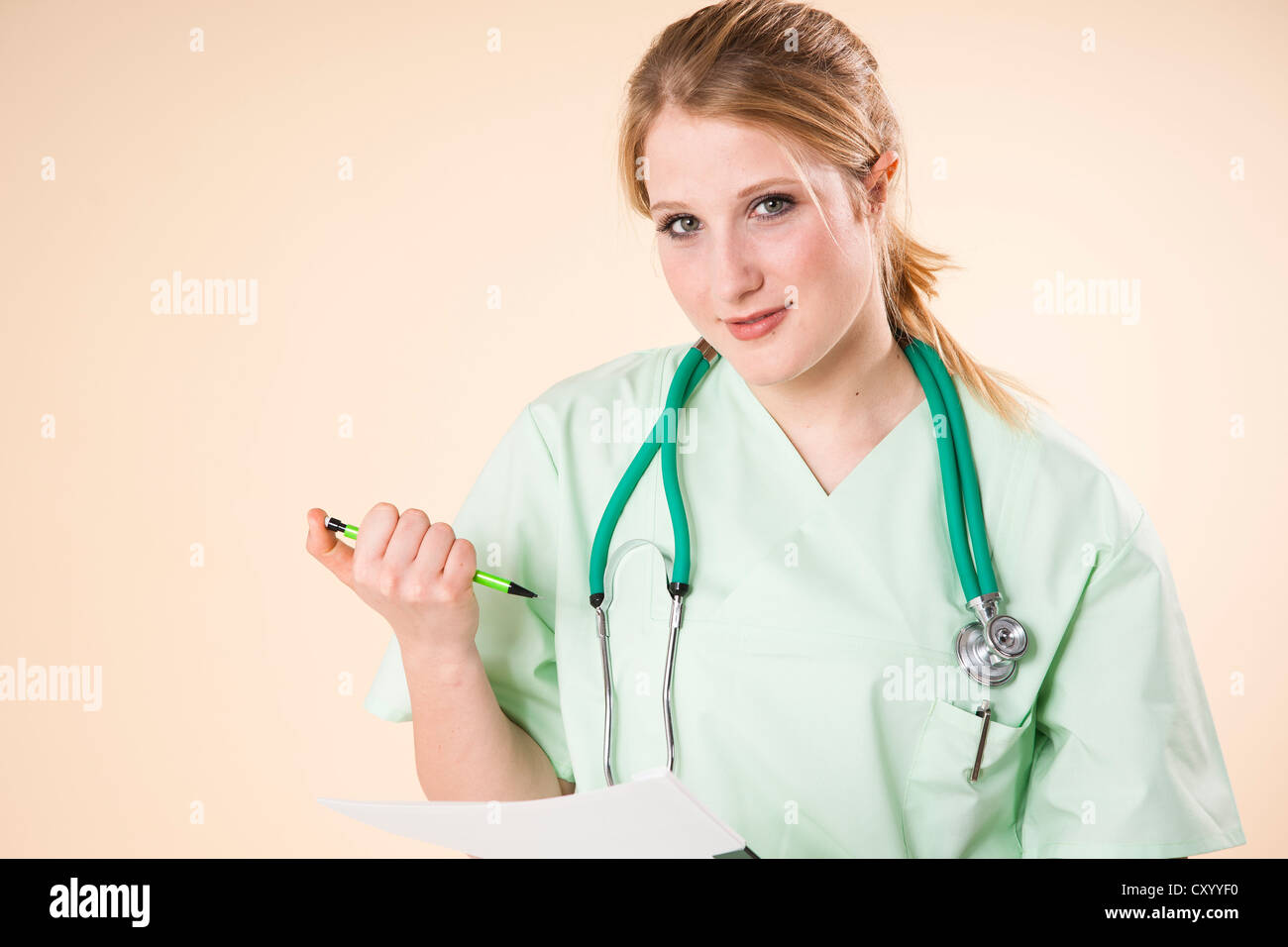 Smiling woman working schemes hi-res stock photography and images - Alamy