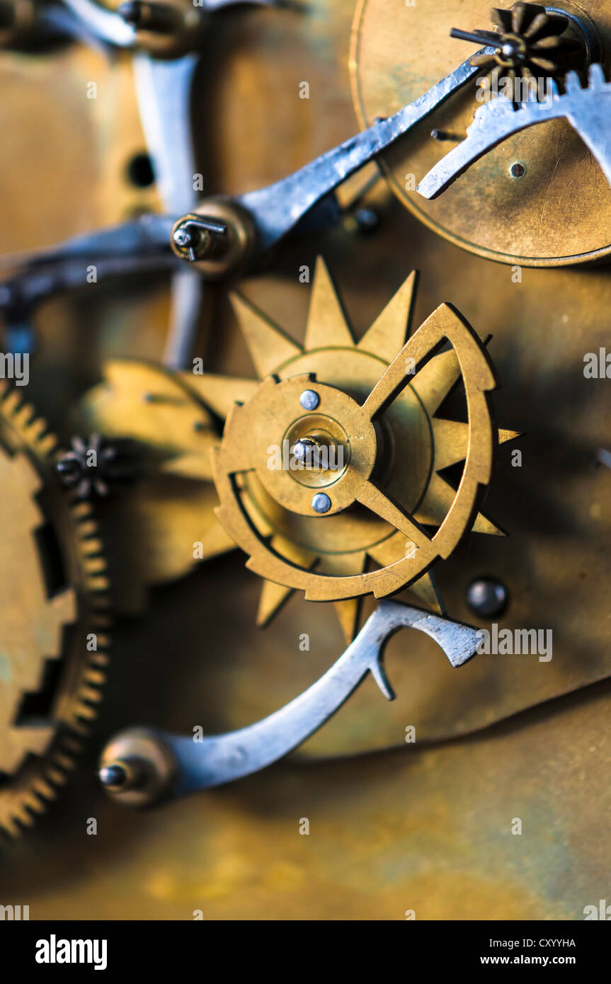 Gears and cogs in the clockwork of a historical pendulum clock, detail, regulator Stock Photo