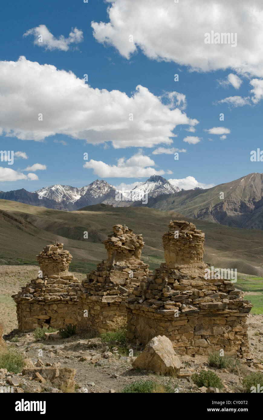 At an altitude of 14,200ft (4,300m), ancient chortens line a trail above Kibber village, Spiti, in Northern India Stock Photo