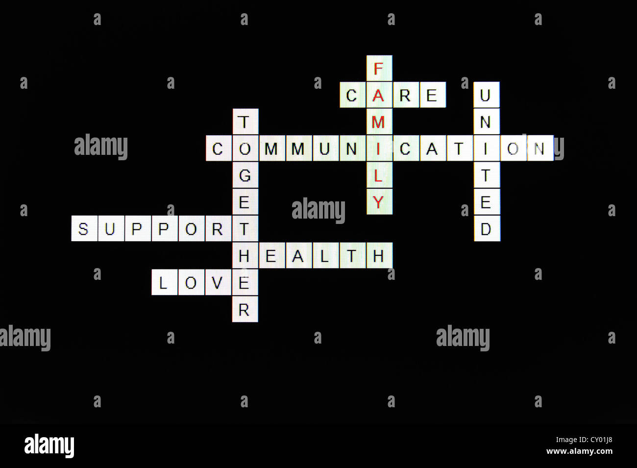 Family concept crosswords on computer screen Stock Photo