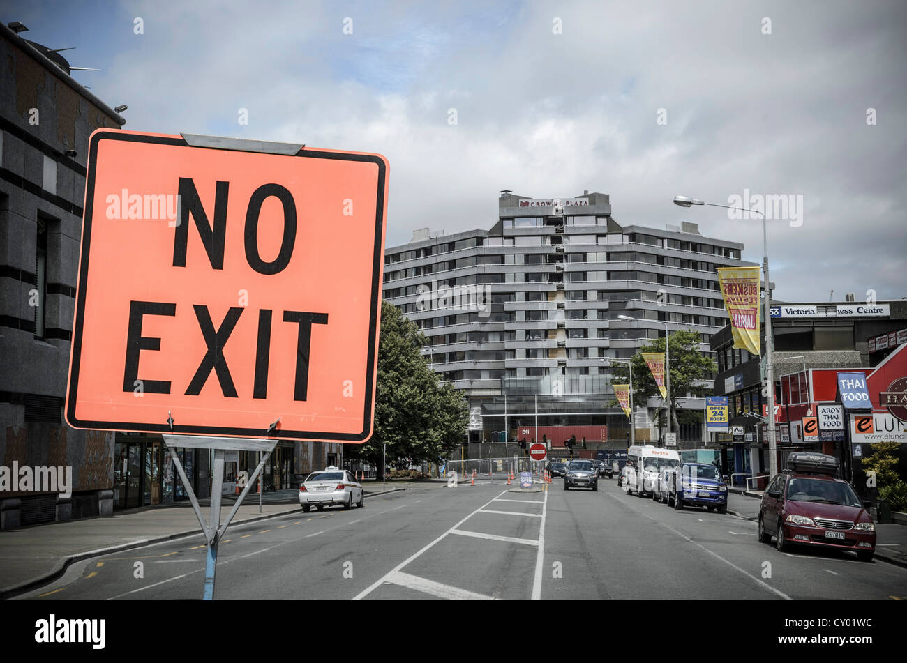No Exit sign, earthquake damage, damaged Crown Plaza, main street of Christchurch, South Island, New Zealand Stock Photo