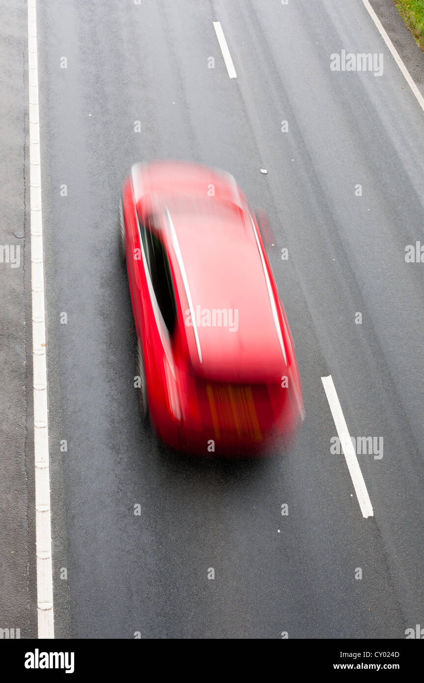 High angle view motion blurred car on fast road. Stock Photo