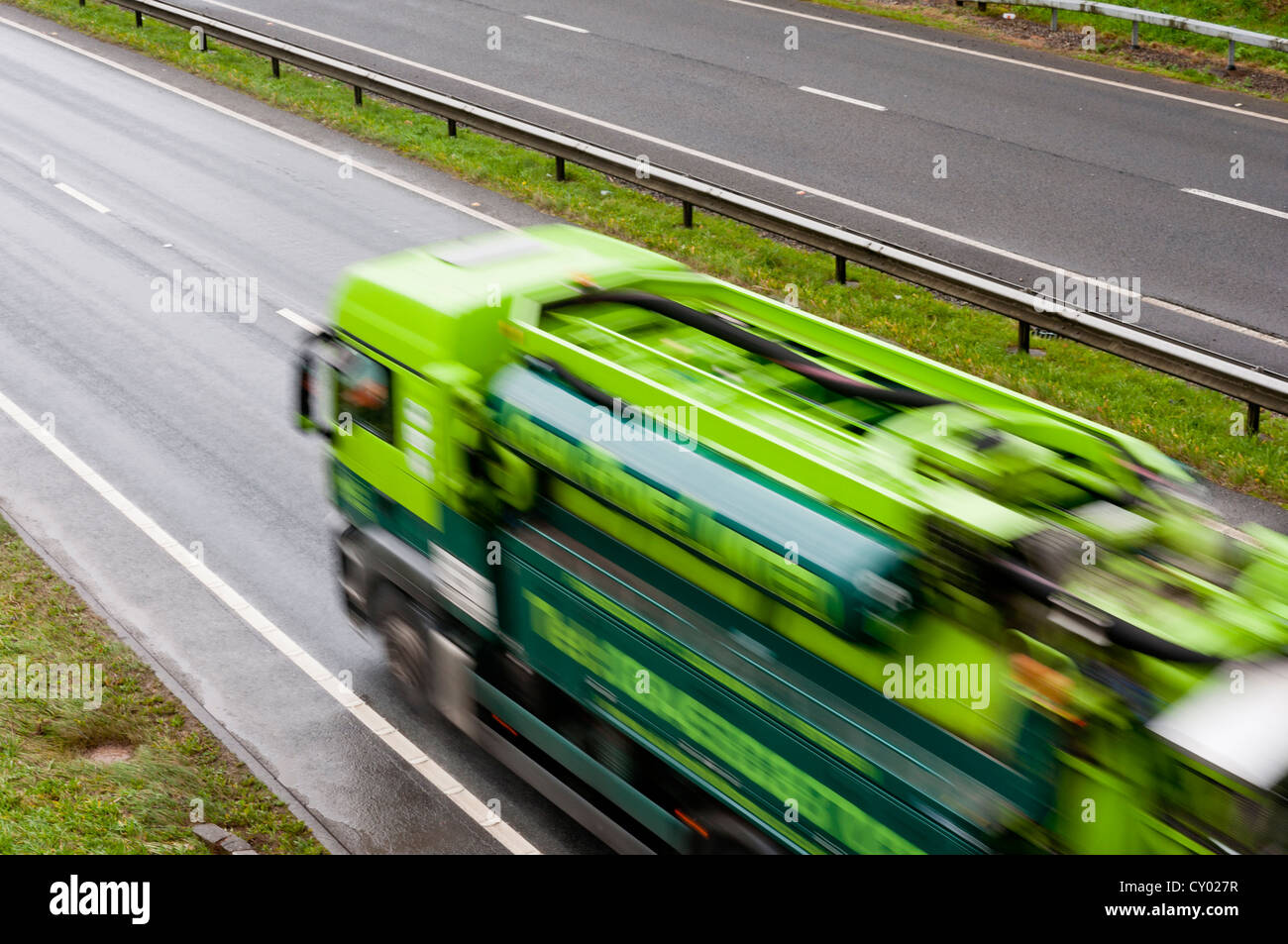 Rubbish truck travelling on dual carriageway UK Stock Photo Alamy